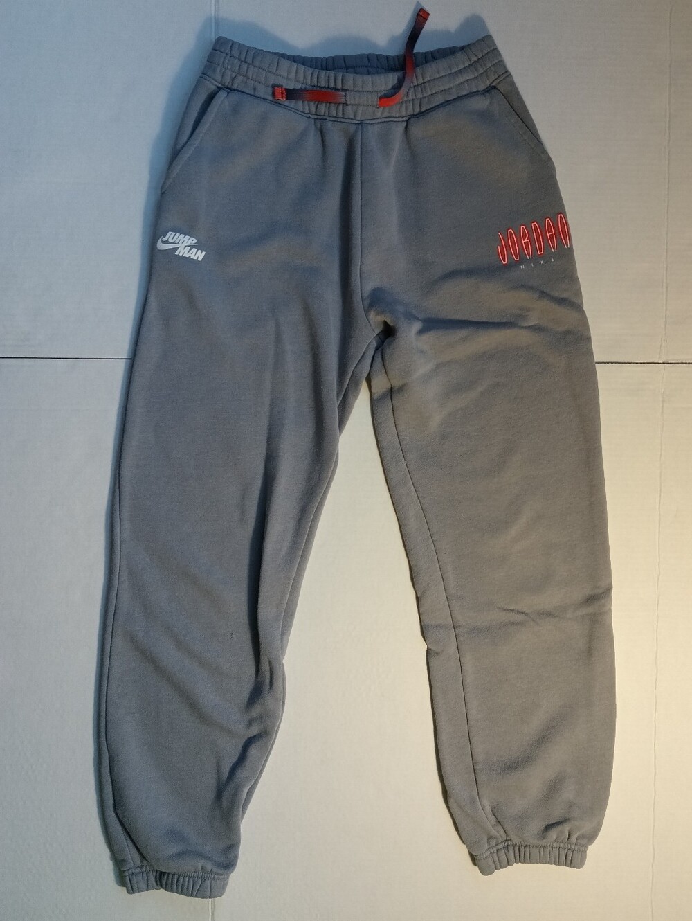 Boy's Jordan Grey Sweatpants with Red Logo Accents Size L